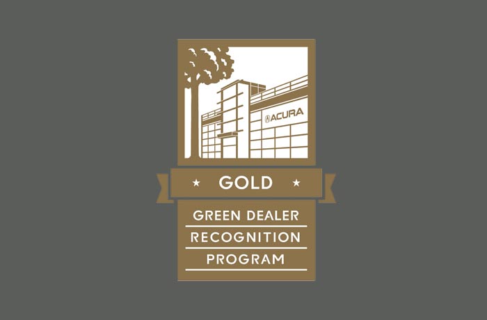 A badge noting Silver status in the Acura Green Dealer Recognition Program."