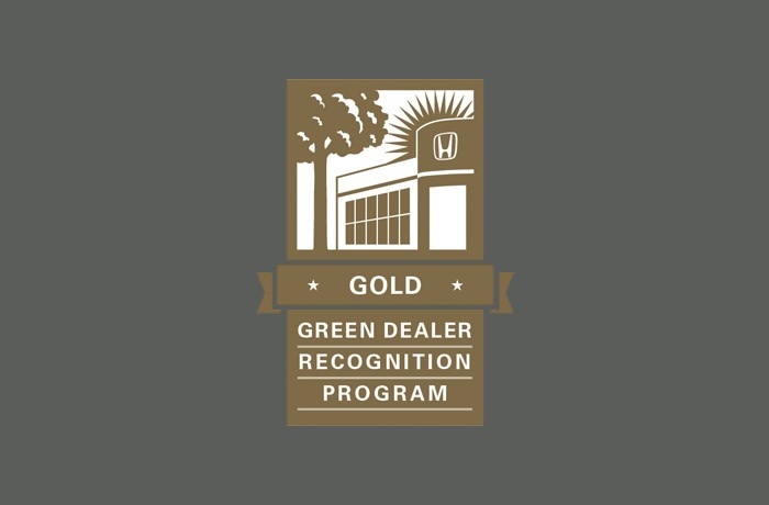 A badge noting Gold status in the Green Dealer Recognition Program