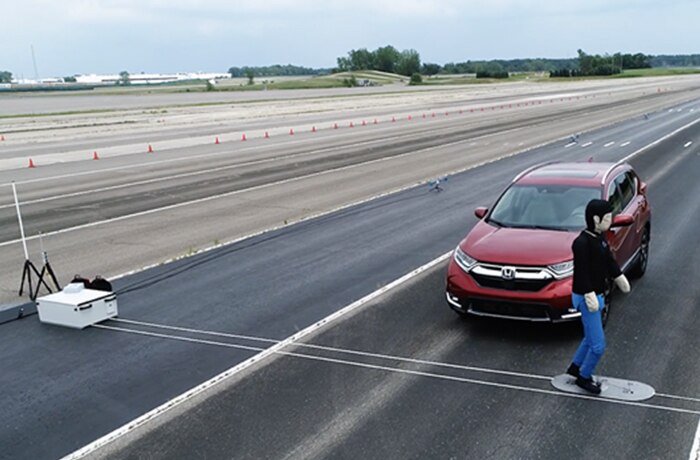 Image of collision mitigation braking system with moving pedestrian avoidance.